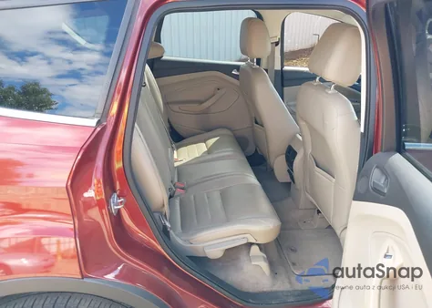 2014 Ford Escape Titanium z USA, uszkodzony, nr VIN 1FMCU0J9XEUA89585